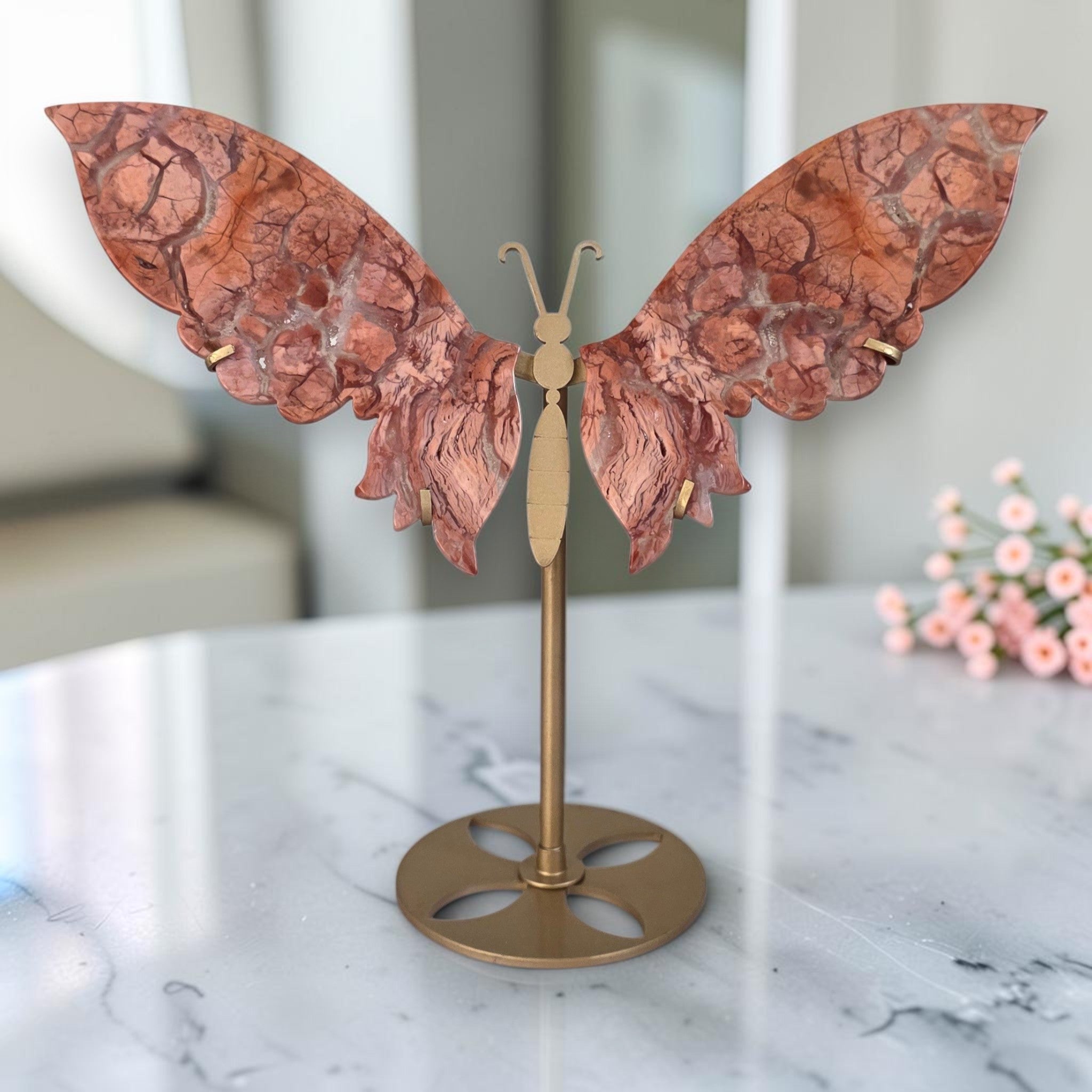 Cotton Candy Agate butterfly on antique gold stand, front view with cherry blossoms