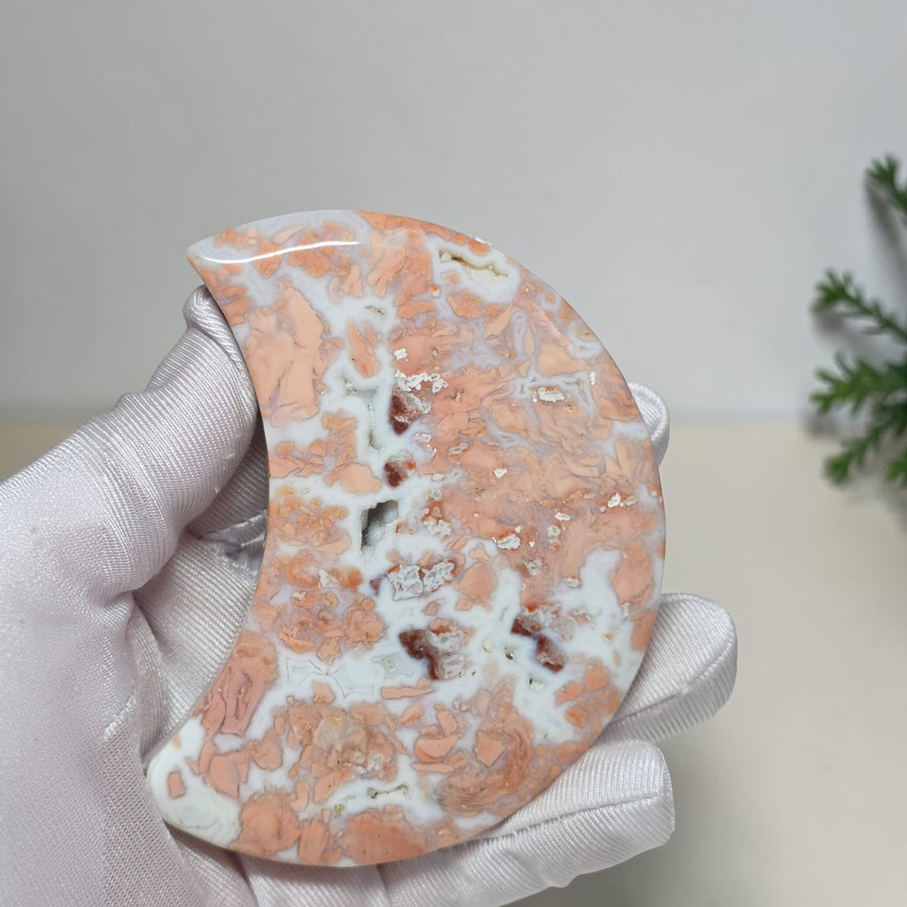 Back of Cotton Candy Agate moon showing patterns and small surface openings