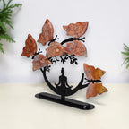 Angled view of Cotton Candy Butterfly Tree on its black display base
