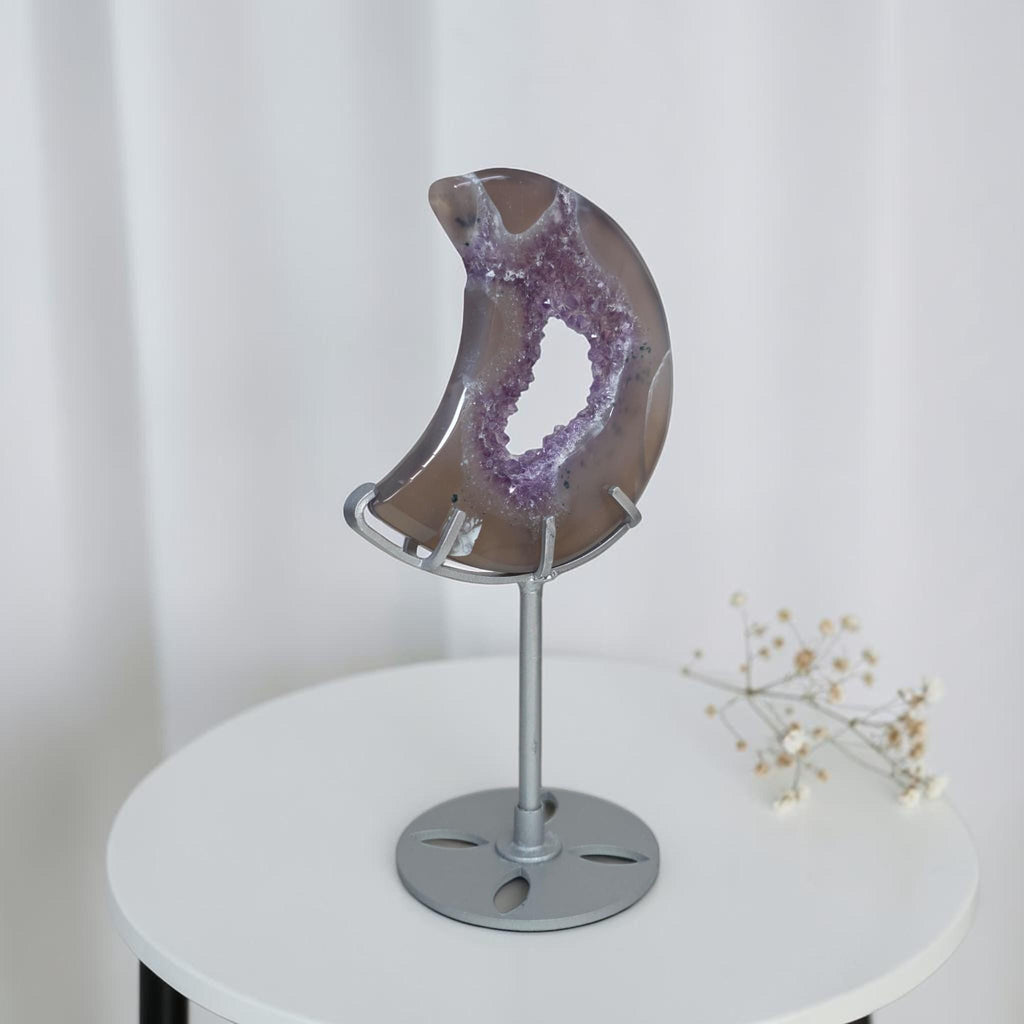 Purple geode crescent moon decor on round metal base with post