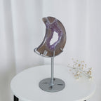 Purple geode crescent moon decor on round metal base with post
