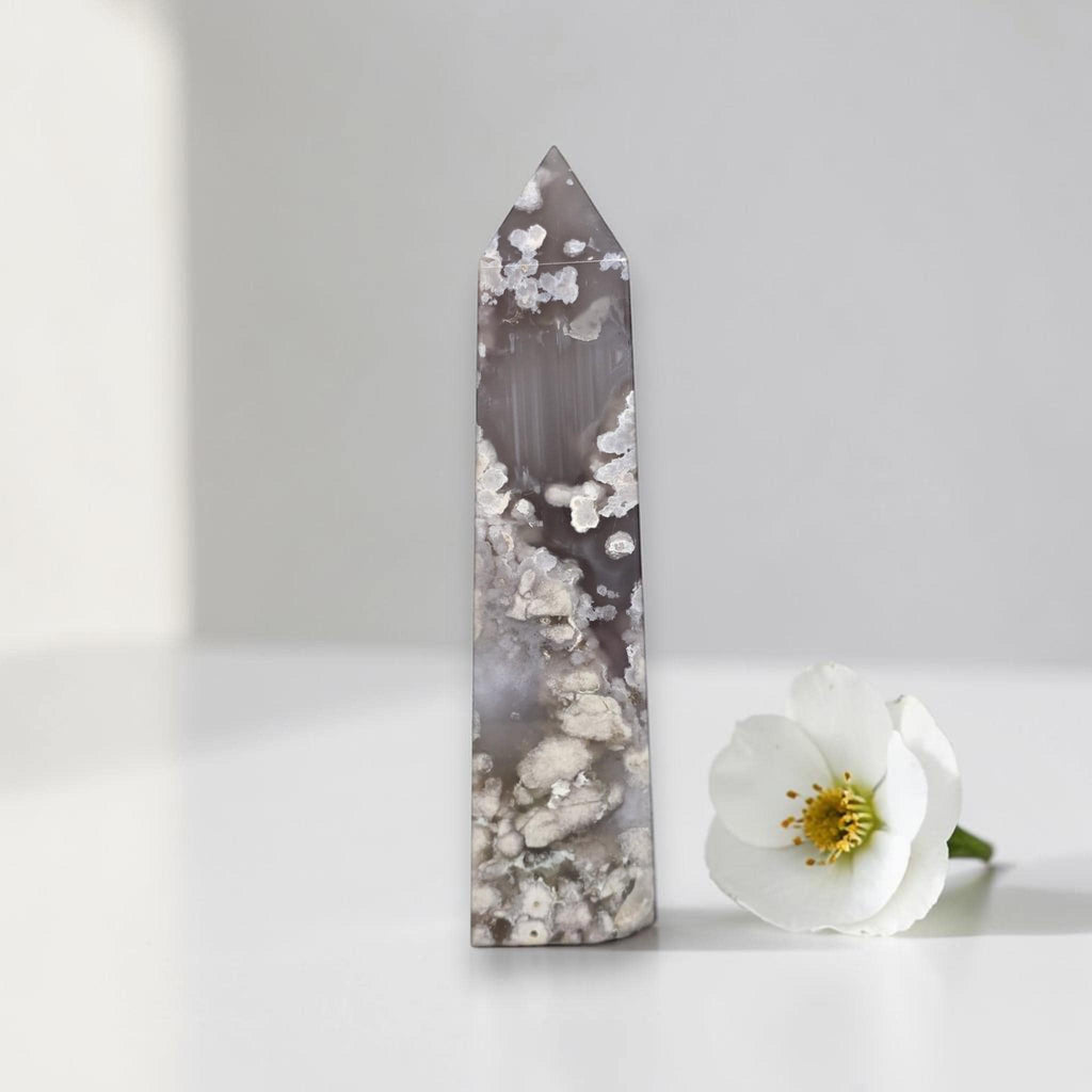 Flower agate crystal tower, purple-gray with white flower-like mineral formations