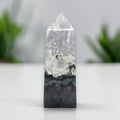 Polished moss agate tower, white-gray banding with dark base and natural green inclusions