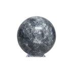Dark gray jasper crystal ball sphere with speckled pattern on clear stand