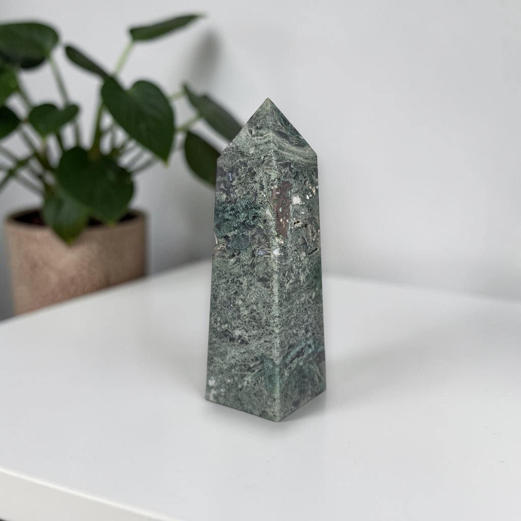 Green moss agate obelisk crystal tower with pointed top and banded stone marks