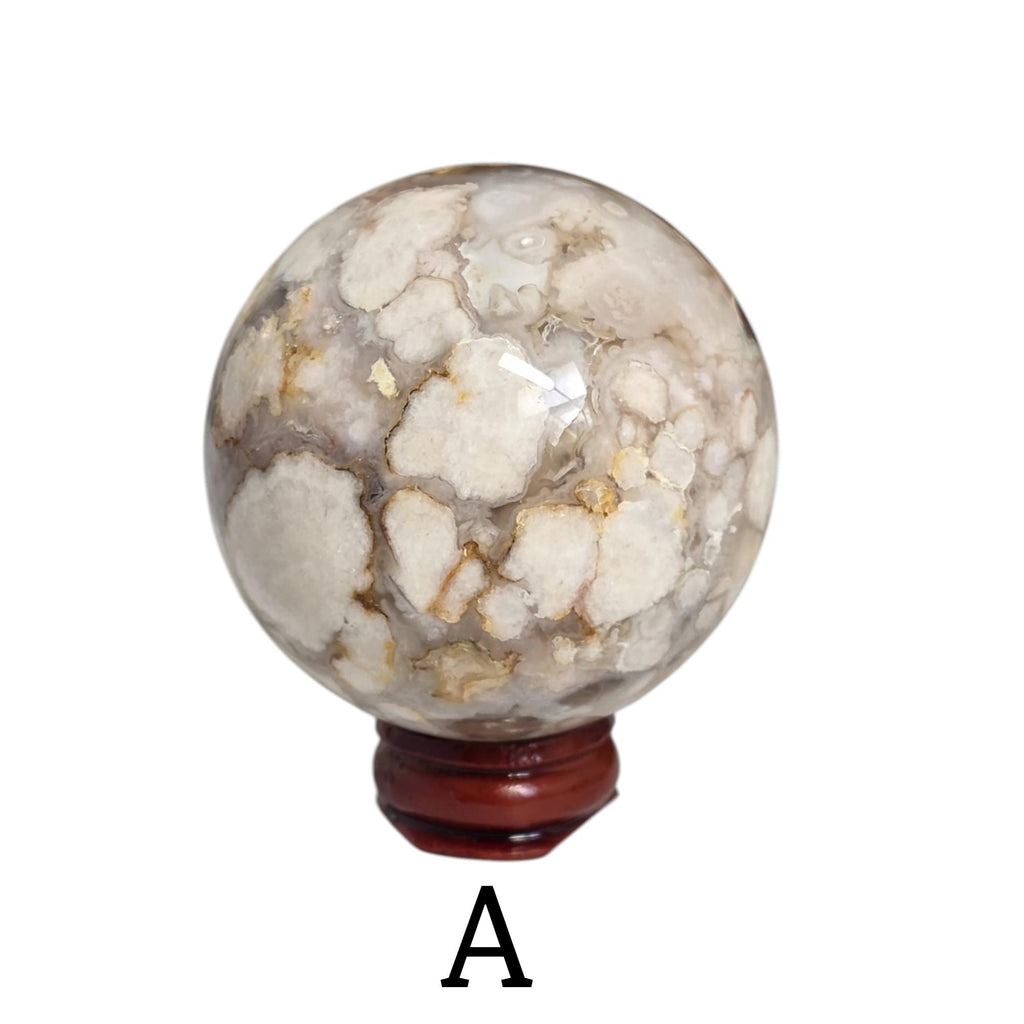 Flower agate drusy sphere on dark red base, mostly white with tan mineral veining