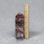 Fire Quartz tower next to ruler showing 5 inch size