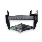 Fluorite star sculpture measured with calipers, green and purple