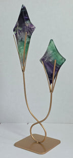 Fluorite star sculptures on gold stand, two star ornaments