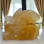 Golden Healer Quartz flying dragon carving with golden wings and curled tail