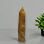 Golden Healer Quartz tower polished point close-up