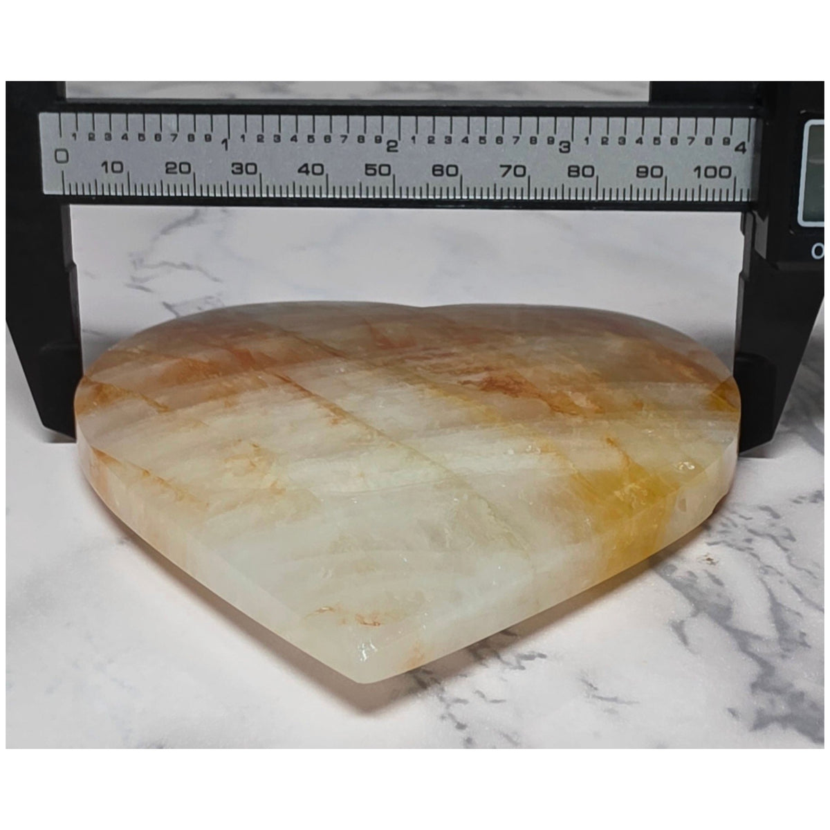 Golden Healer quartz heart measuring approximately 4 inches across