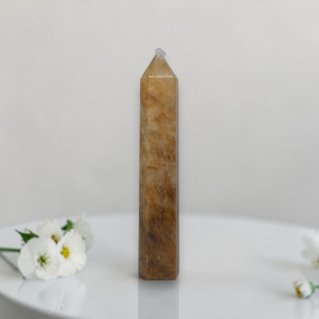 Golden quartz tower with pointed crystal top, amber/gold, vertical display