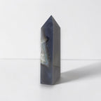 Geometric crystal tower on a white background