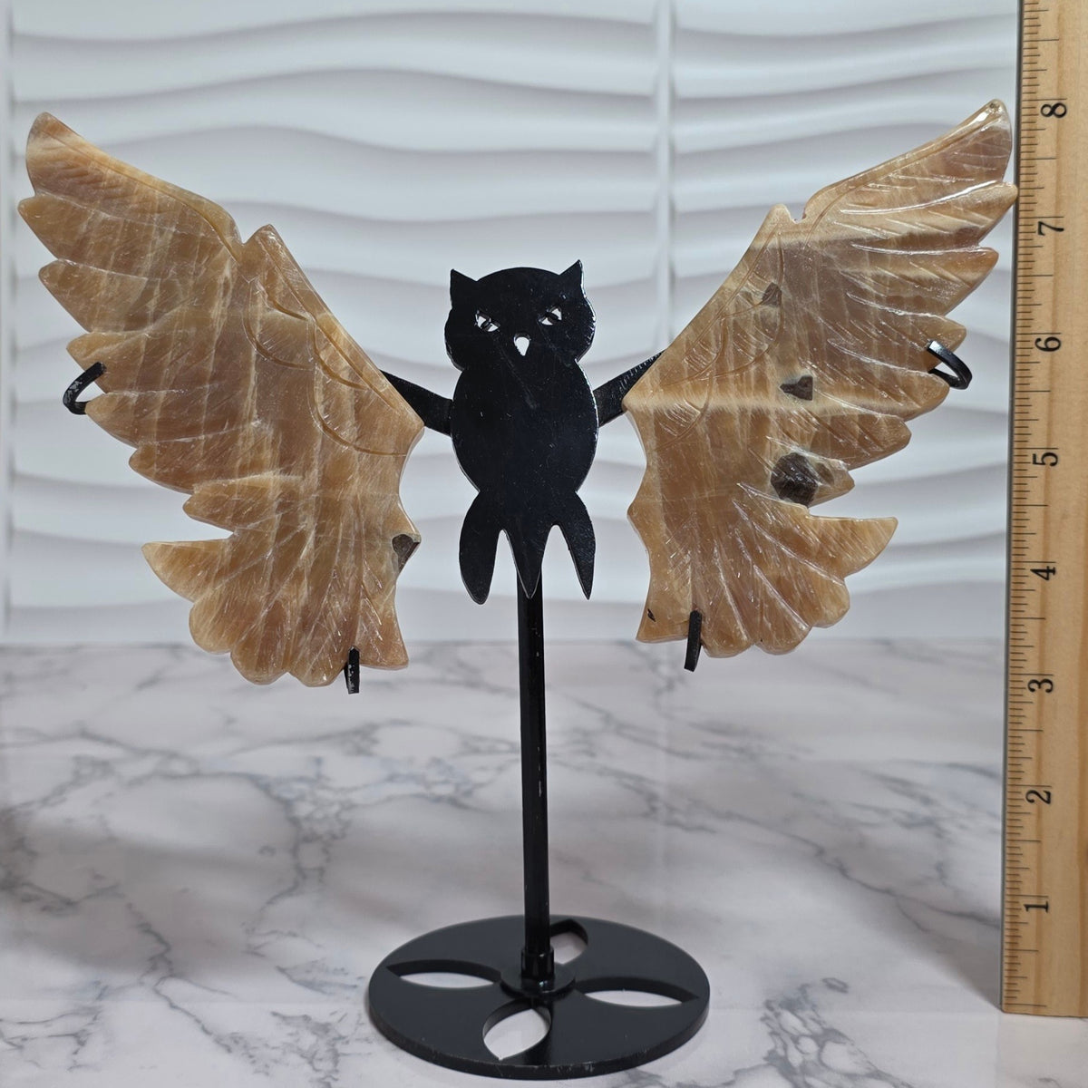 Honey Calcite owl wings sculpture beside ruler showing height with stand