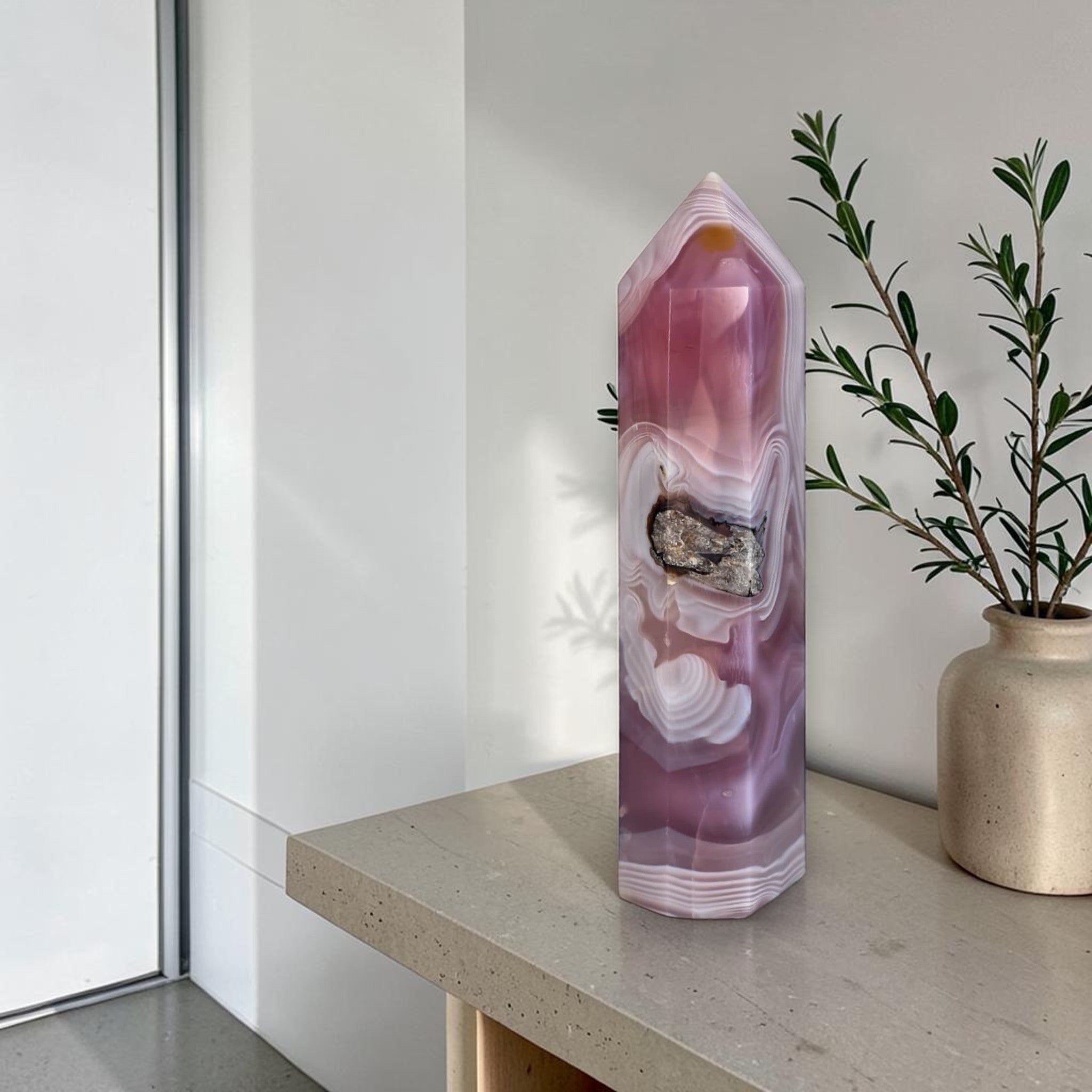 Purple agate crystal point tower with white banding and dark druzy pocket