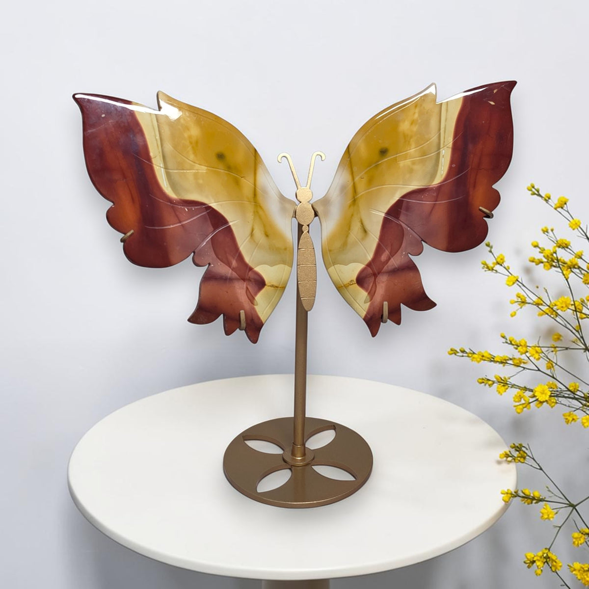 Mookaite jasper butterfly carving shown beside a ruler for size reference