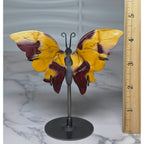 Mookaite Jasper butterfly on stand beside an inch ruler showing approximate overall height