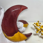Mookaite Jasper crescent moon showing burgundy and mustard yellow colors