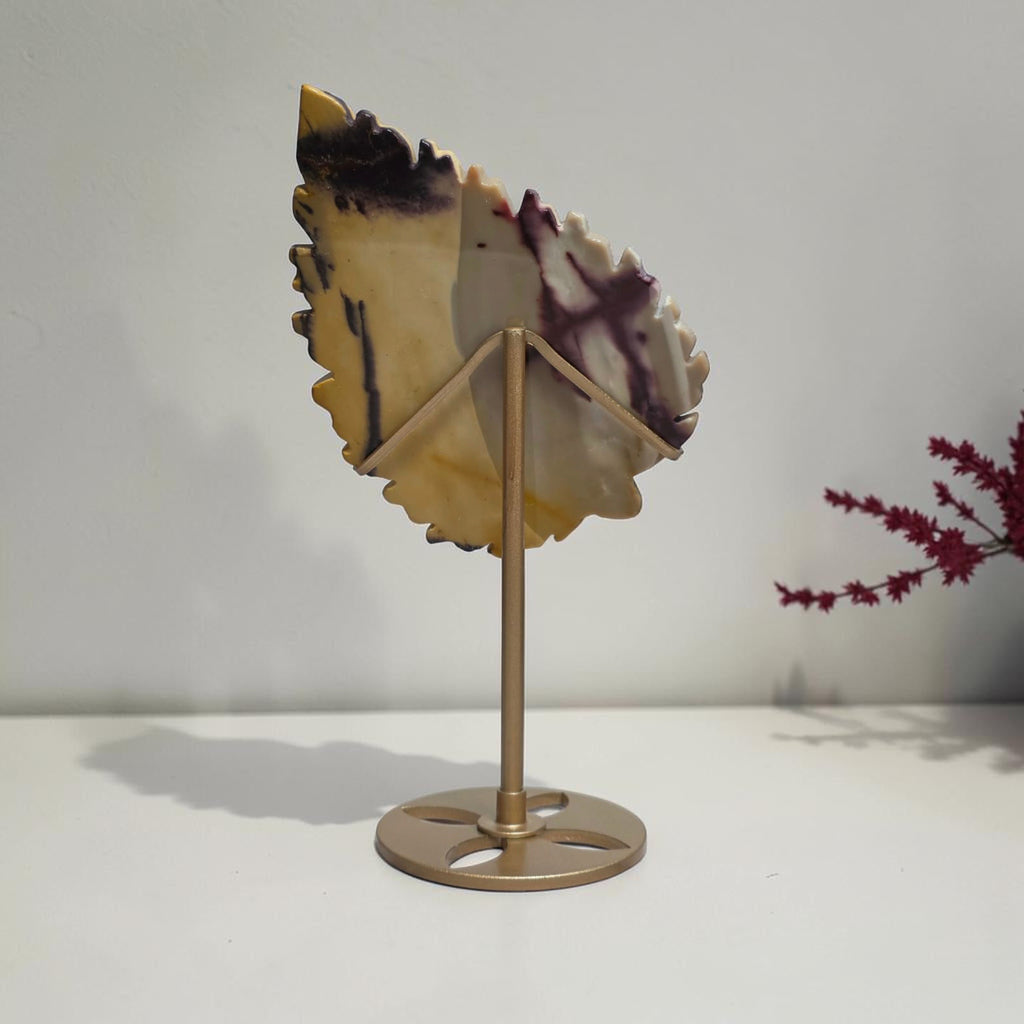 Reverse of yellow and cream Mookaite Jasper leaf carving