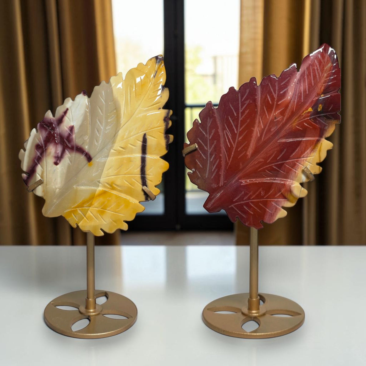 Two Mookaite Jasper leaves on stands, sold separately at $79 each
