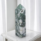 Tall green and white druzy moss agate tower, faceted top, front view