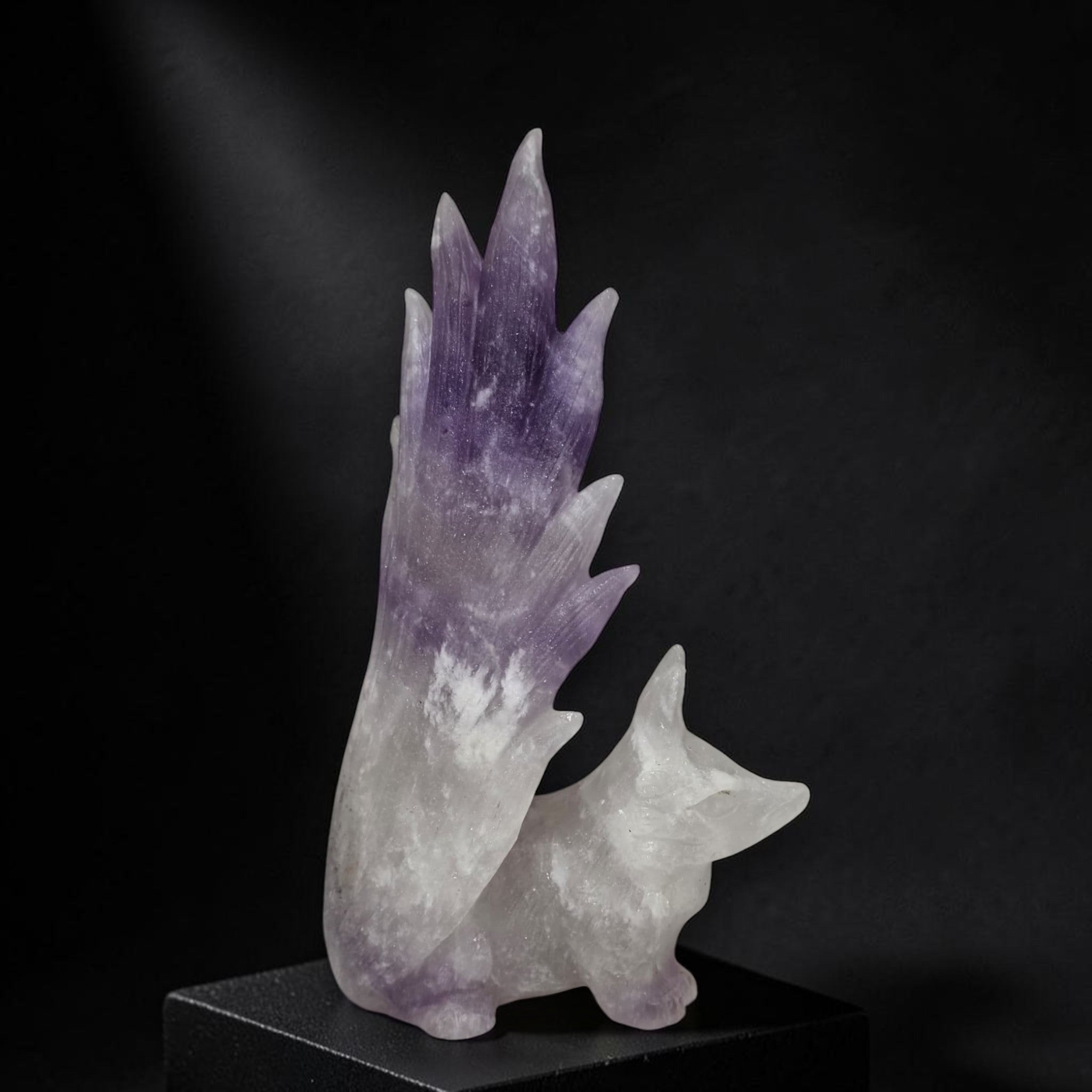 Natural amethyst nine-tailed fox carving side view showing nine tails detail