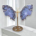 Blue and white agate butterfly sculpture with gold metal stand, front view