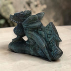 Side view of the smoky gray labradorite dragon carving
