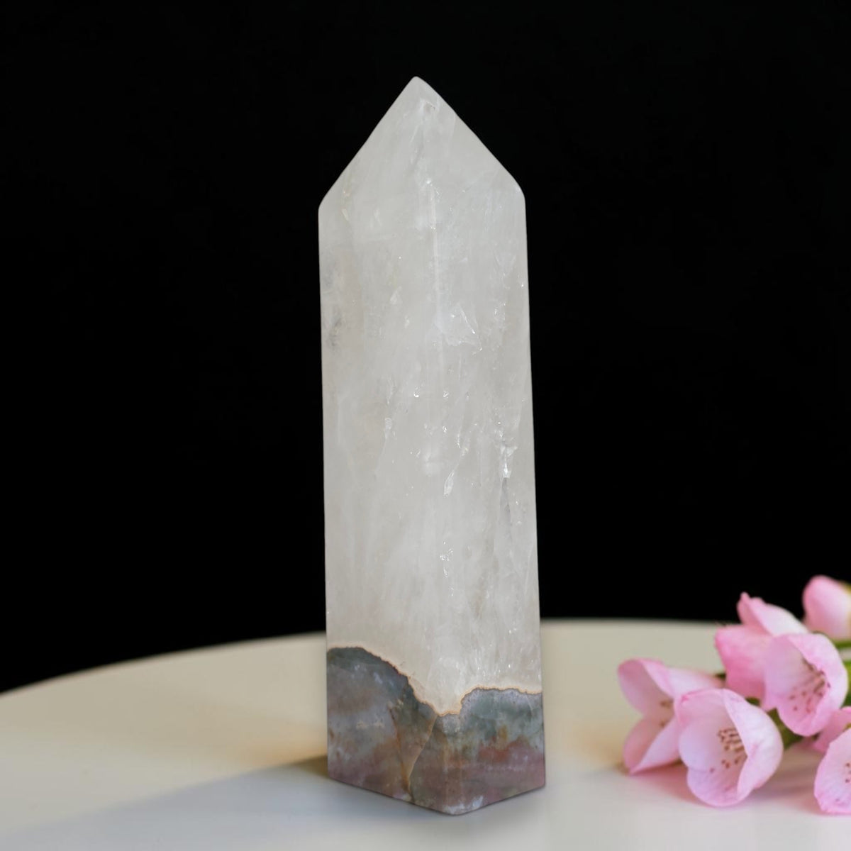Polished quartz tower with an Ocean Jasper base, front view