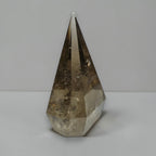 Natural smoky quartz tower crystal lifestyle photo