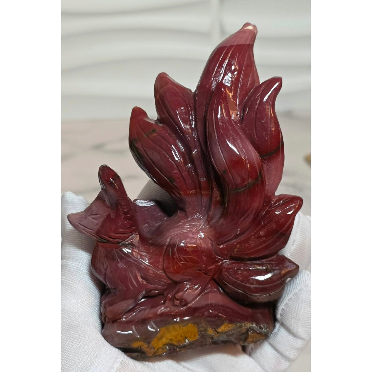 Burgundy mookaite nine tails fox carving front closeup