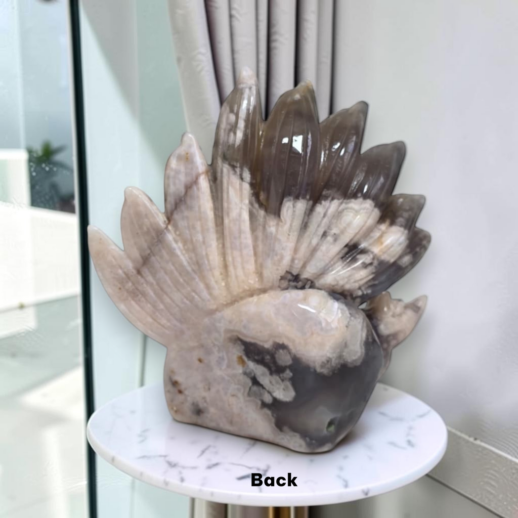 Flower Agate Nine Tails Fox back view showing peachy pink banding