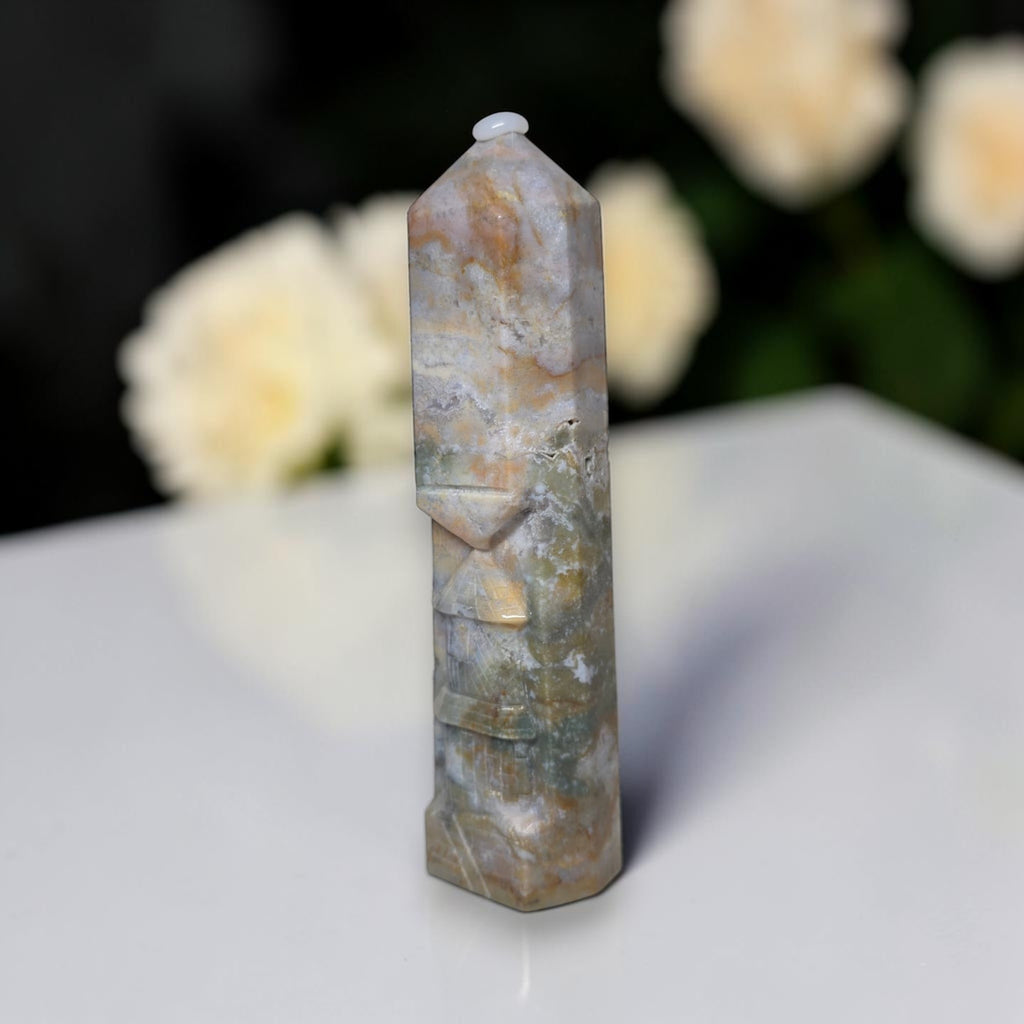Ocean jasper statement tower, faceted midsection with layered carved lines