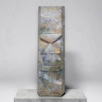 Ocean jasper house carving tower with faceted layers, blue-gray and tan stone