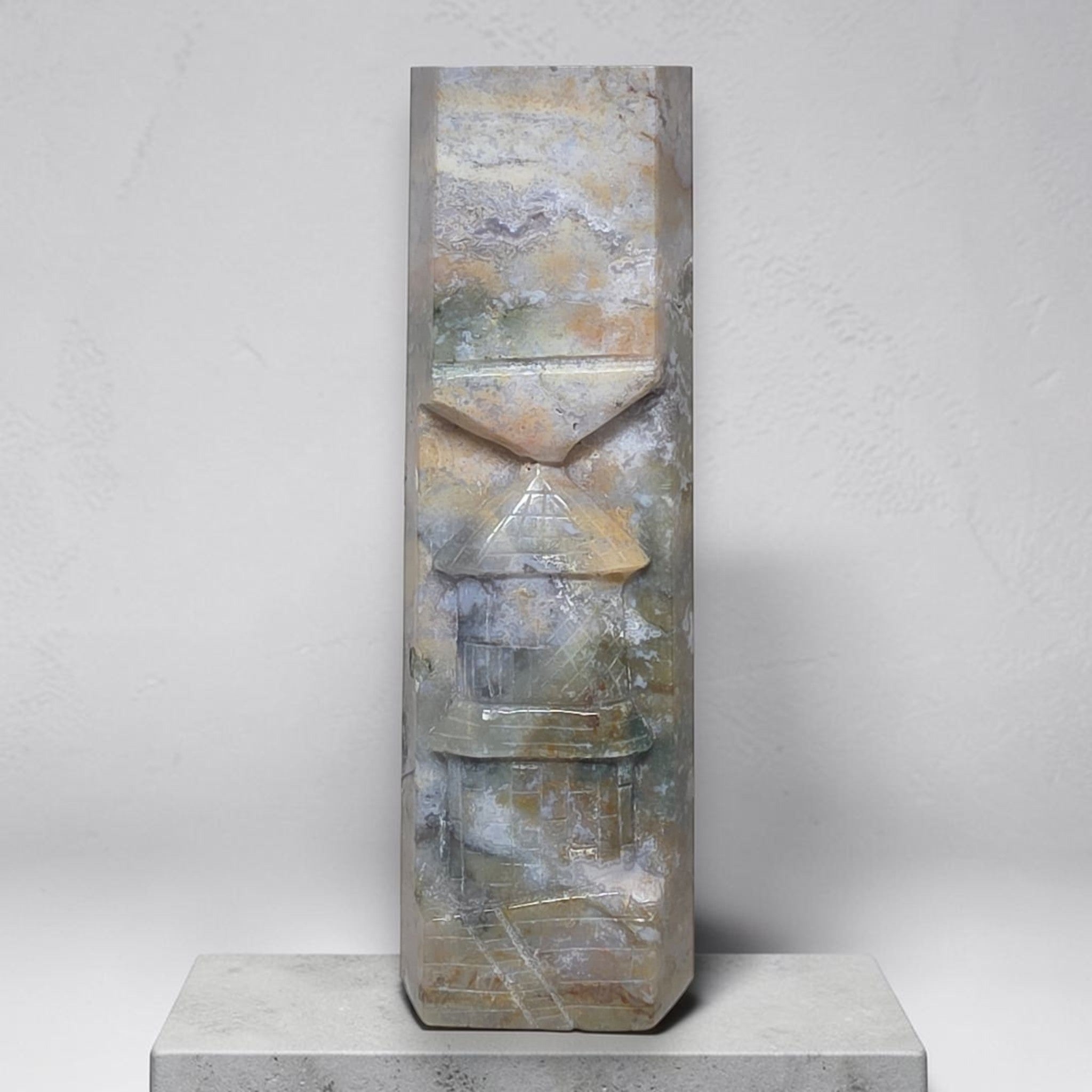 Ocean jasper house carving tower with faceted layers, blue-gray and tan stone