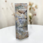 Ocean jasper carving tower front view, stacked carved facets in blue-gray tones