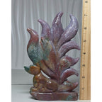 Ocean jasper nine-tail fox crystal carving beside measuring ruler for size