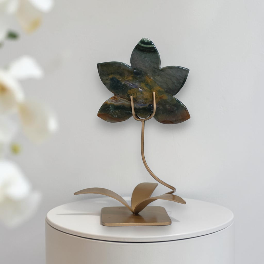 Ocean Jasper carved orchid on gold tone stand without sphere