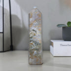 Ocean jasper tall carving tower with octagonal top and carved horizontal bands