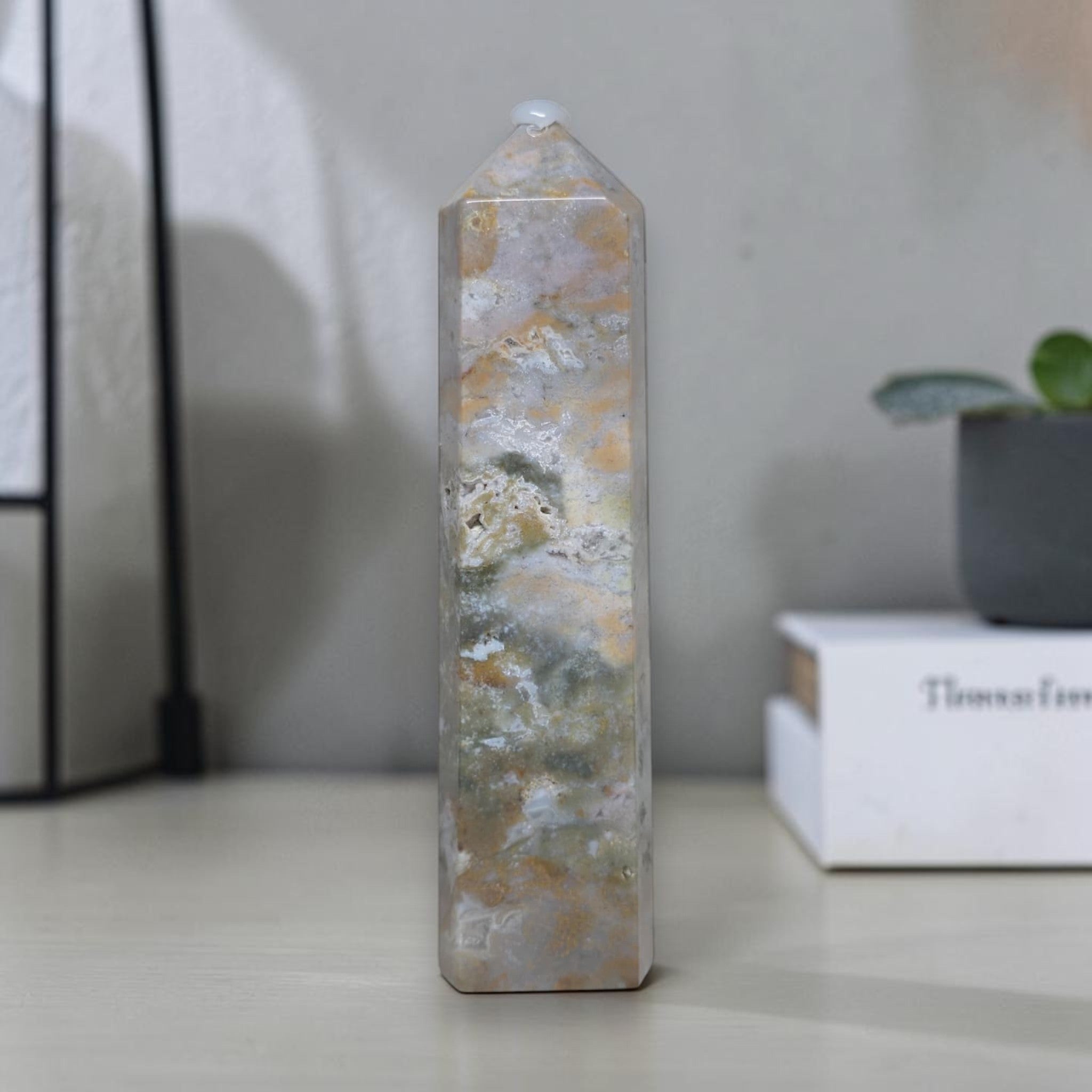 Ocean jasper tall carving tower with octagonal top and carved horizontal bands