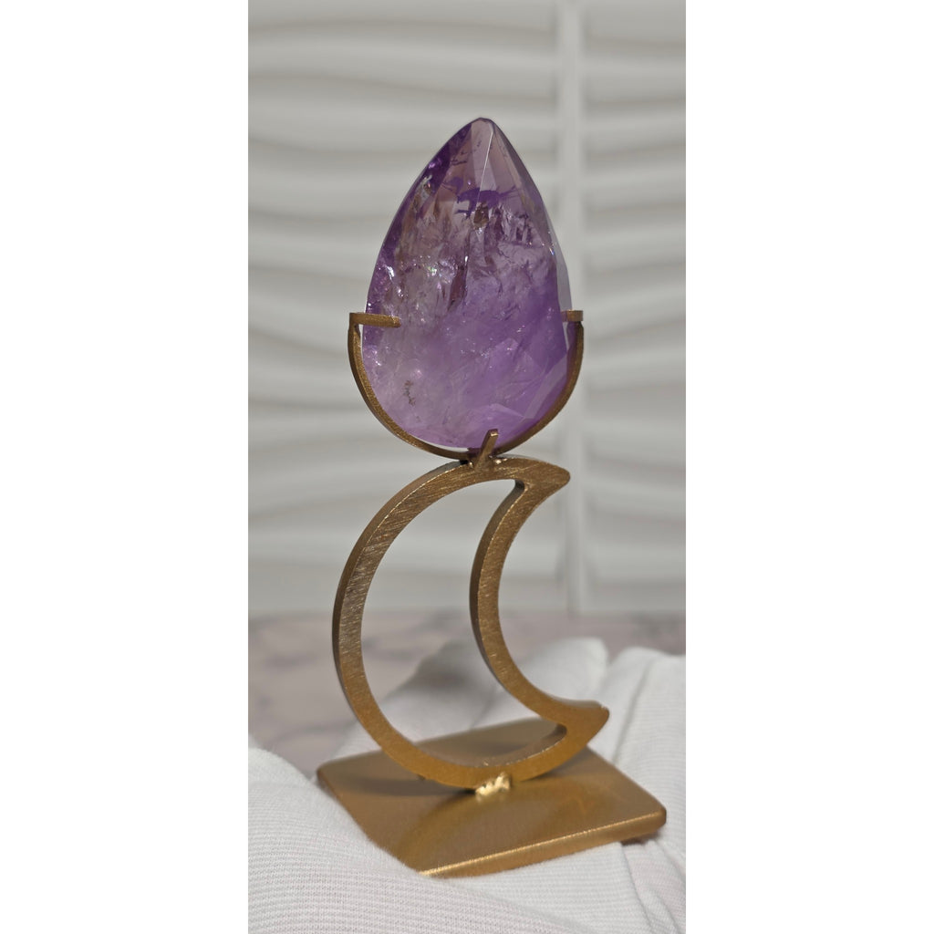 Purple amethyst crystal teardrop with gold tone moon stand