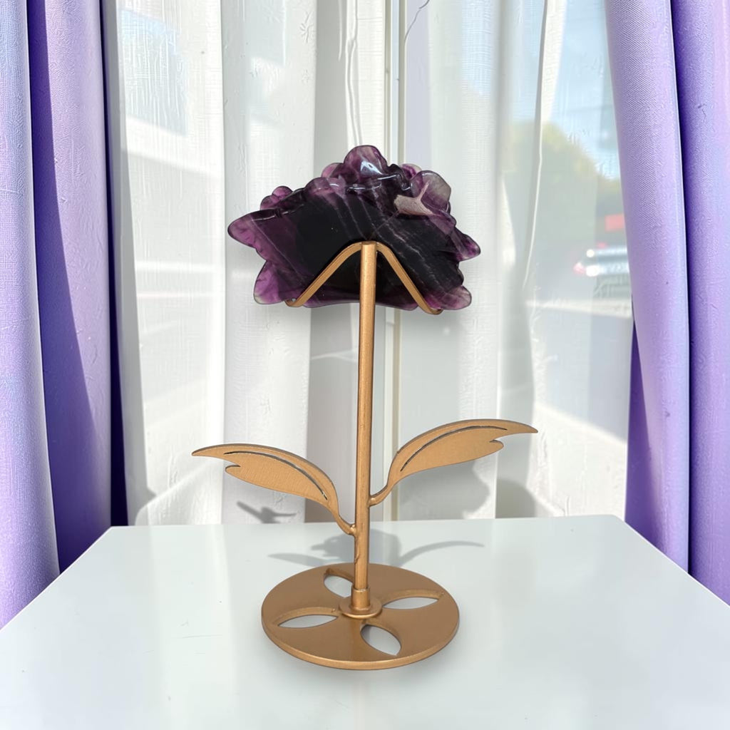 Purple fluorite rose carving on gold stand, back view showing petal detail