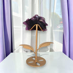 Purple fluorite rose carving on gold stand, back view showing petal detail