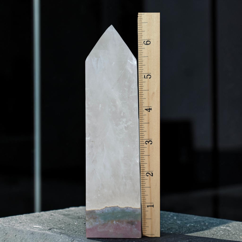 Quartz tower with Ocean Jasper base beside a ruler showing its height