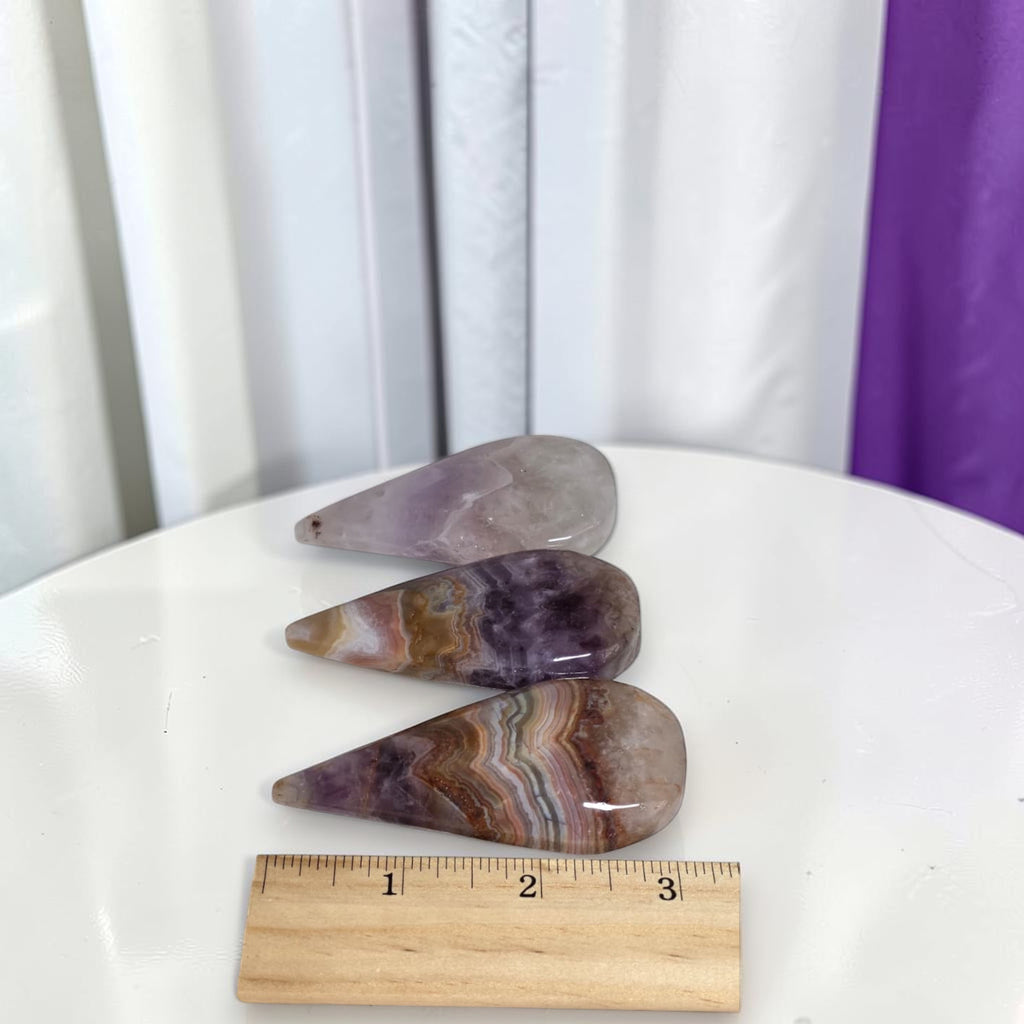 Amethyst lace agate raindrop teardrops with ruler showing size approximately 3 inches