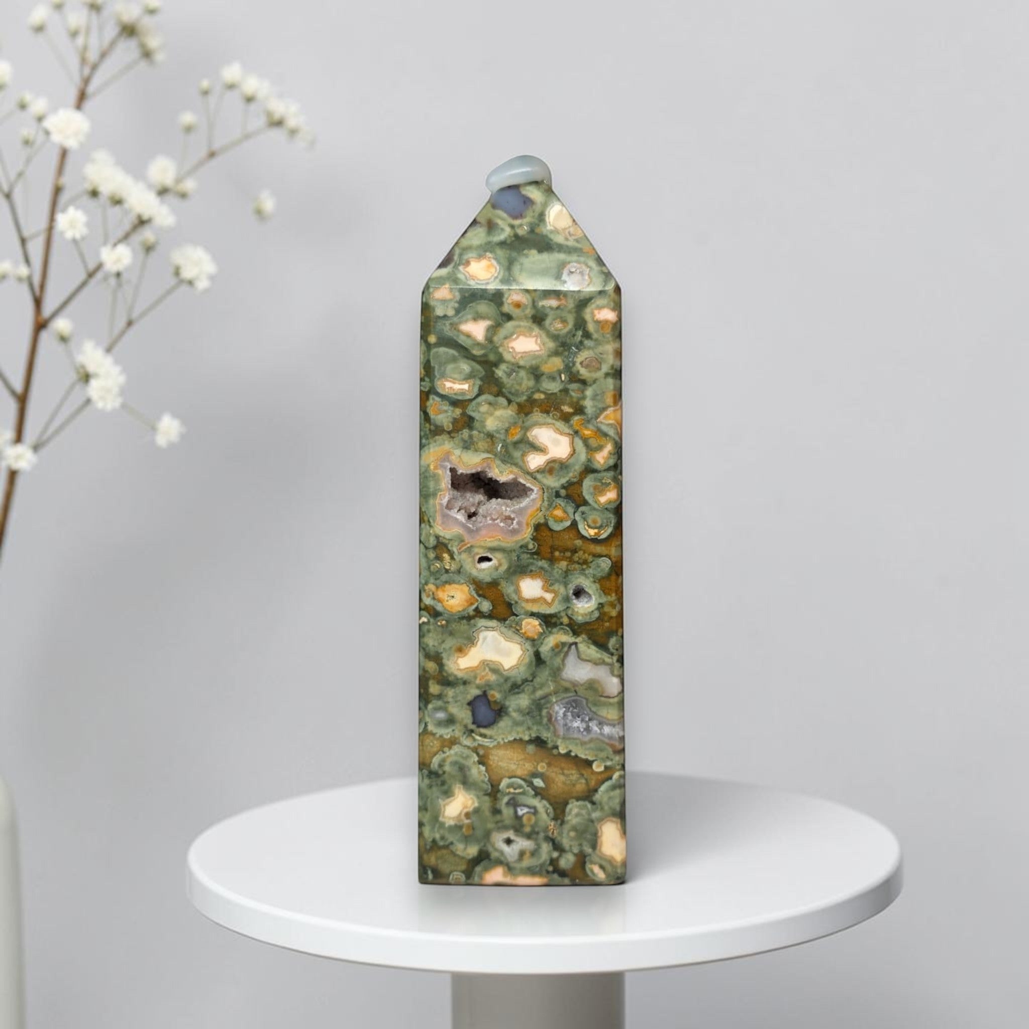 Rainforest jasper druzy tower with light gray cap, green field with tan and orange pockets