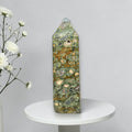 Rainforest jasper druzy tower, green-and-brown stone with tan druzy-like spots and gray pits