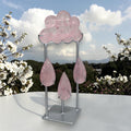 Rose quartz rain cloud crystal sculpture with three dangling teardrop crystals