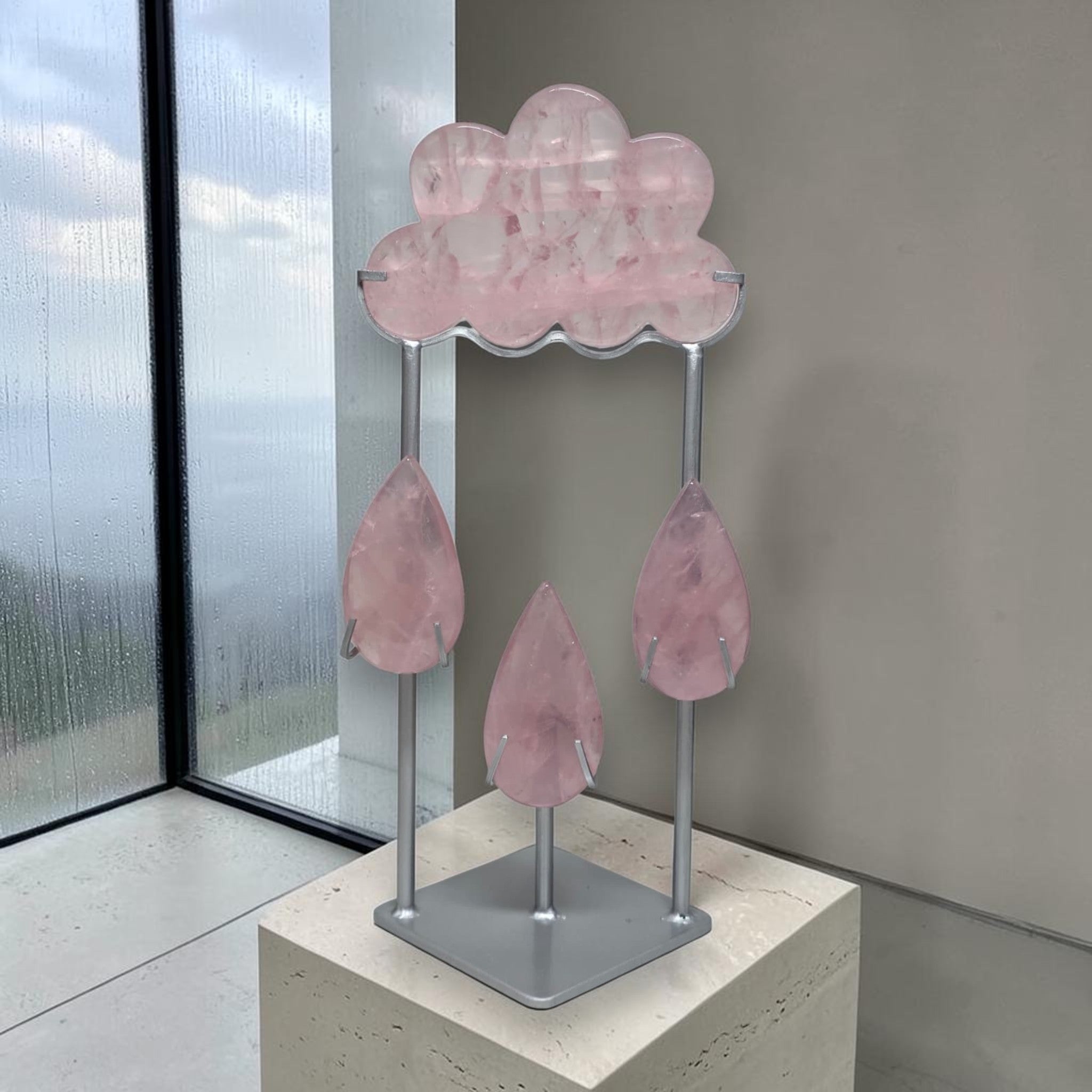 Rose quartz rain cloud crystal sculpture on metal base with hanging crystal drops